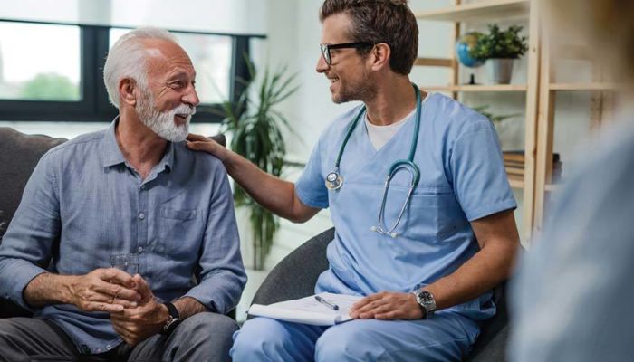 Doctor reassuring patient friendly like family